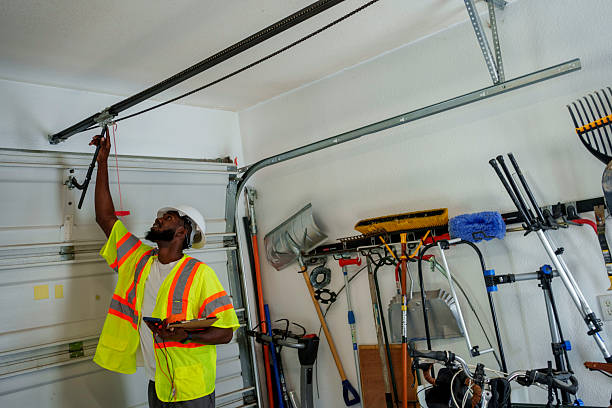 Professional Garage Door Roller Replacement technician working in Hampton Manor, NY